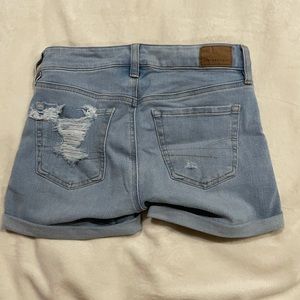 American Eagle Light wash shorts with rips